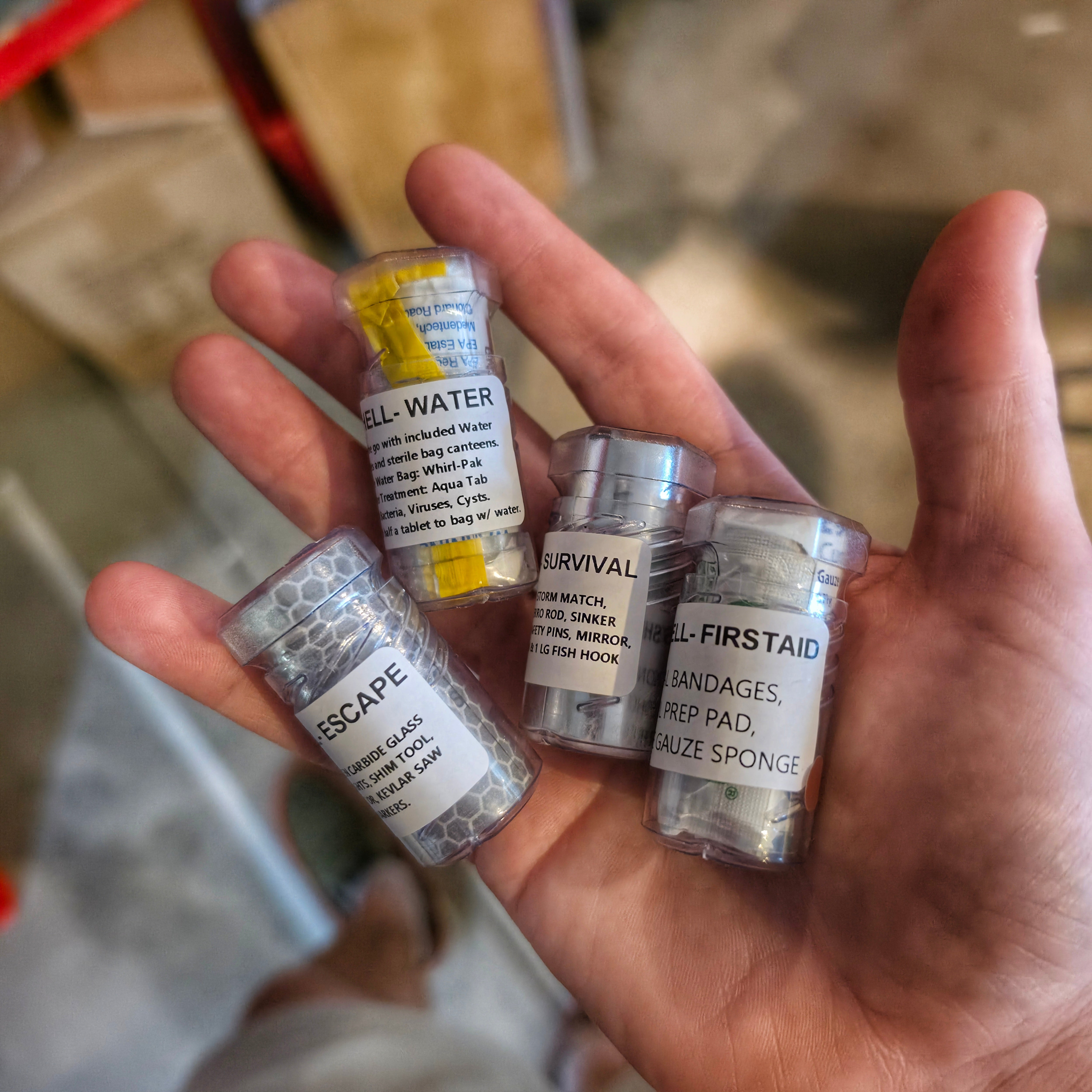 Drop Shell - Polymer Capsule filled with Survival, Escape, and First-Aid Supplies.
