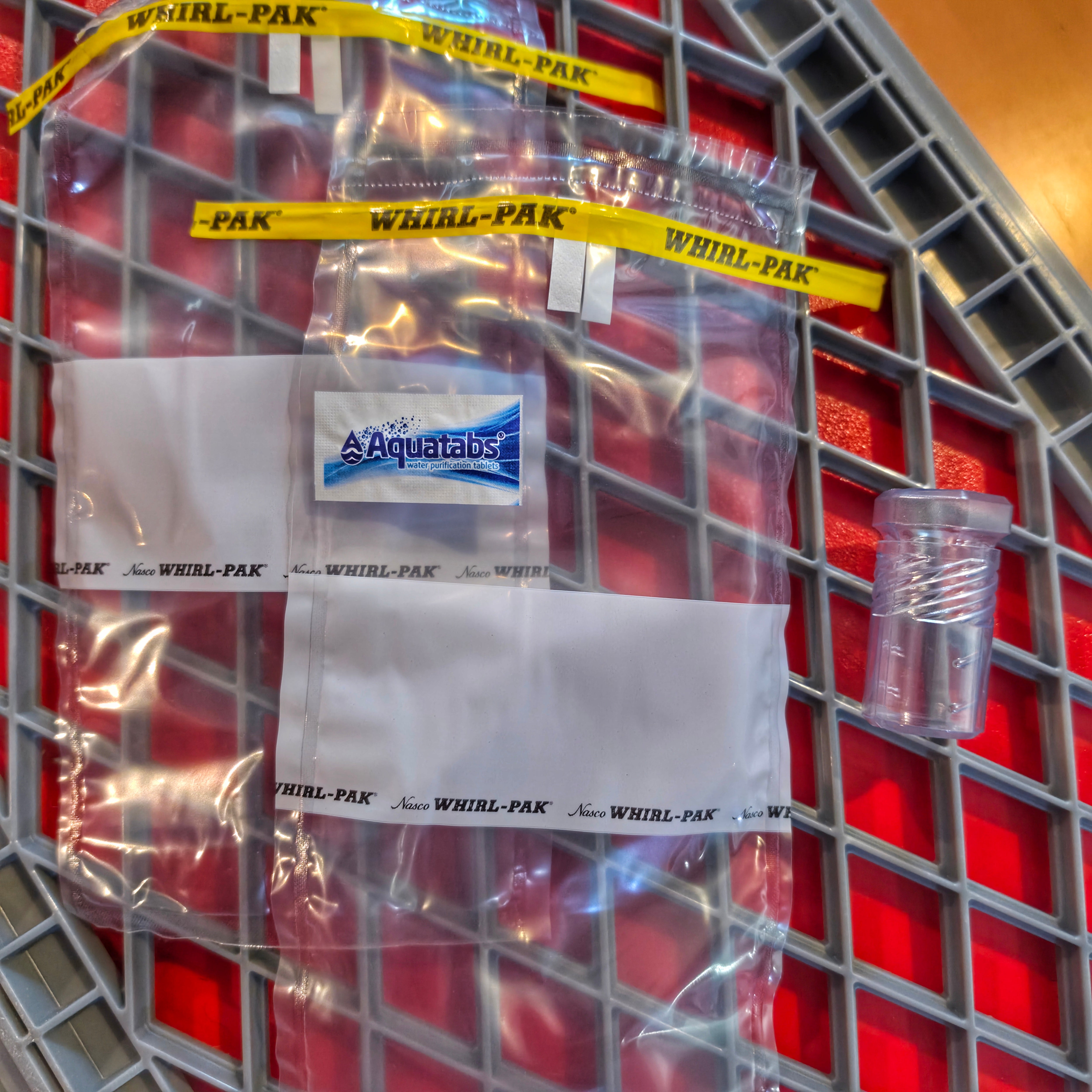 Drop Shell - Polymer Capsule filled with Survival, Escape, and First-Aid Supplies.